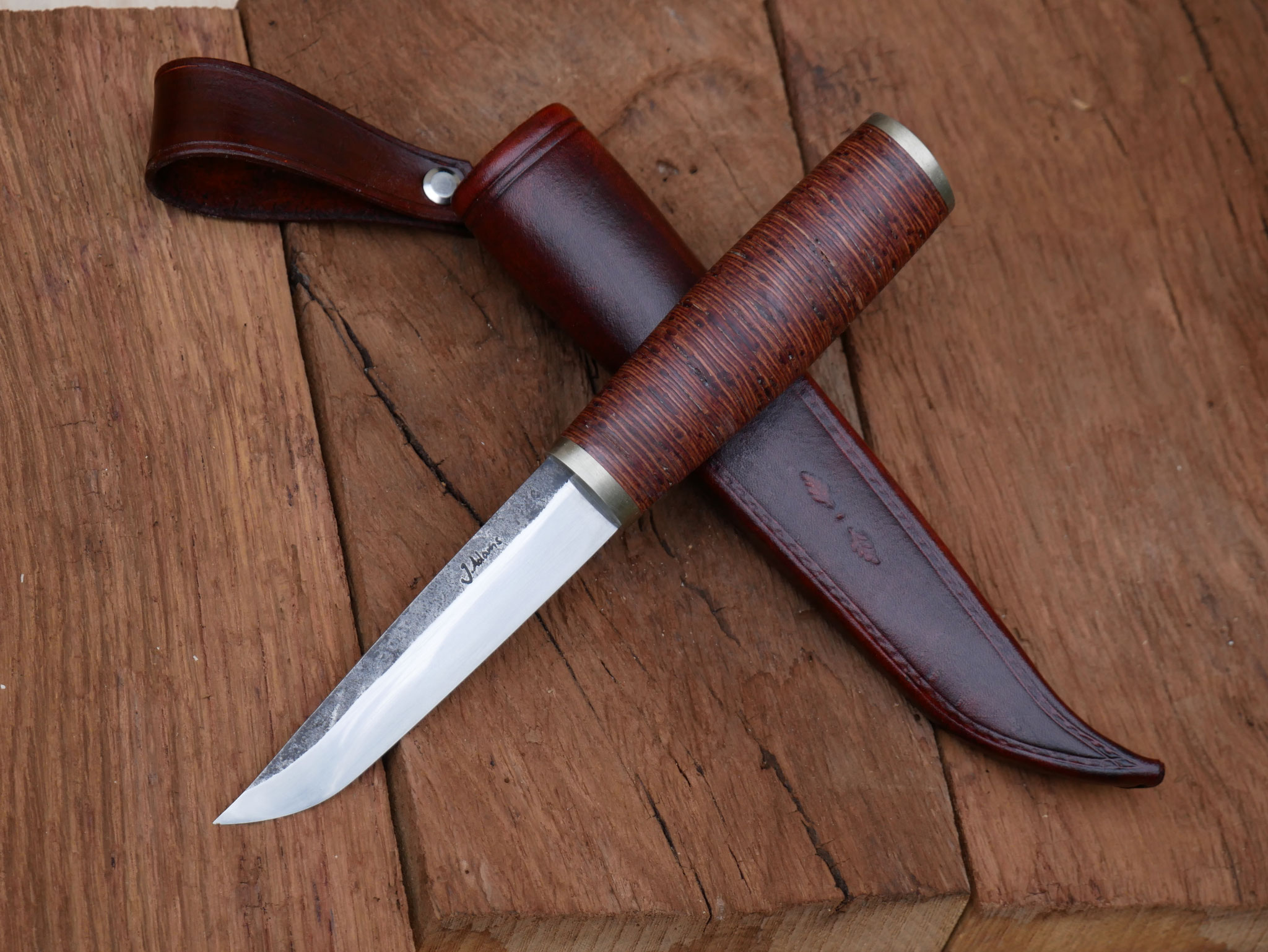 Puukko mit Lederwickelgriff und Scheide